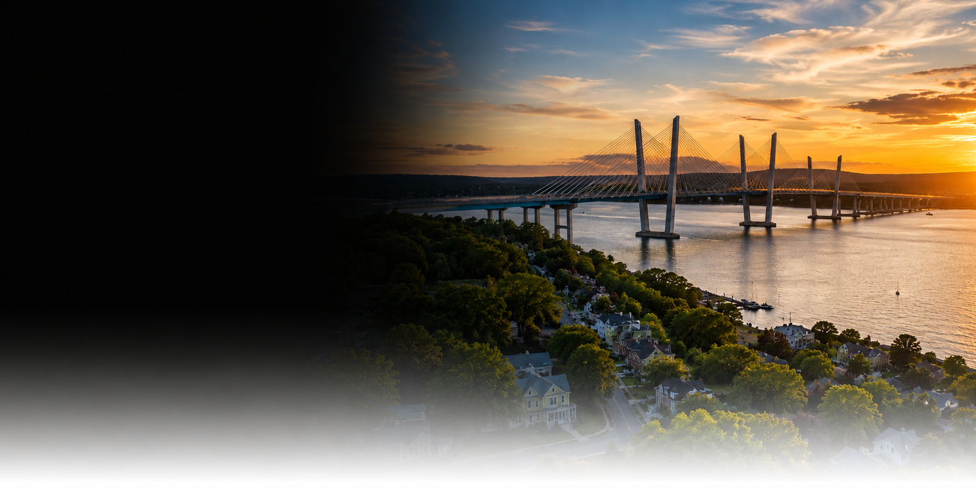 Bridge over water with sunset or sunrise in the background