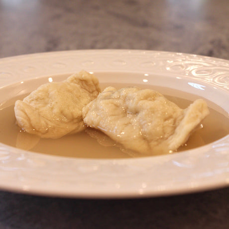 Pictured with Chicken Consommé.