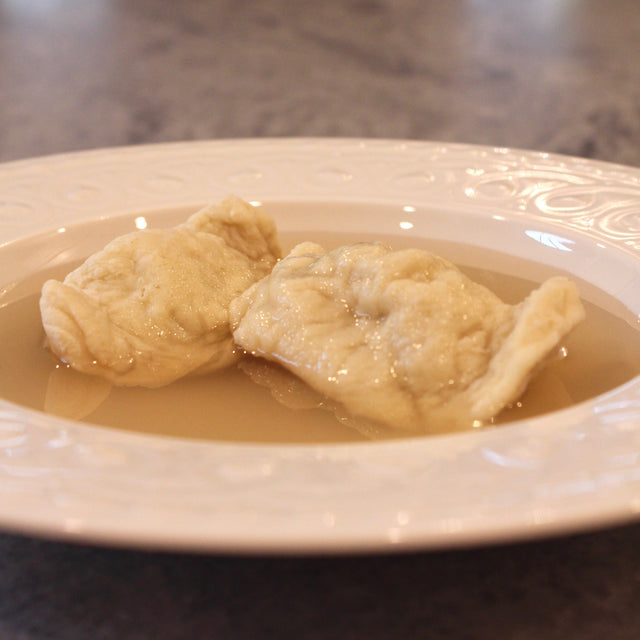 Pictured with Chicken Consommé.