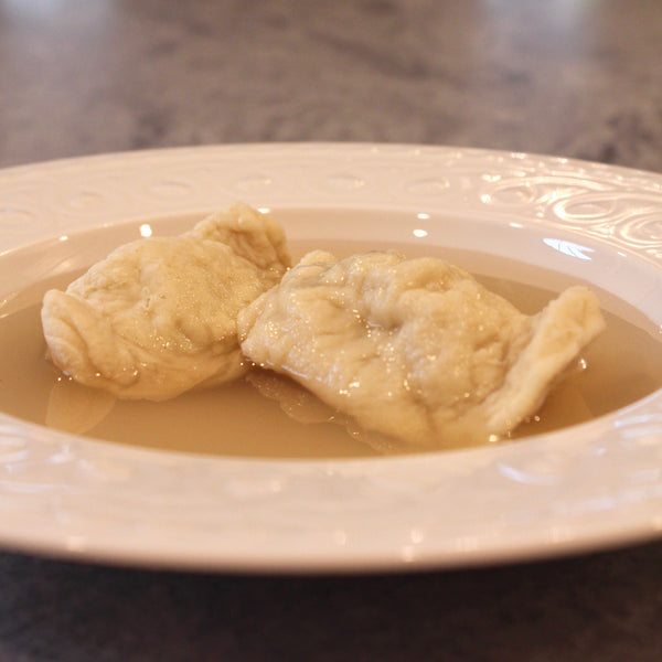 Pictured with Chicken Consommé.