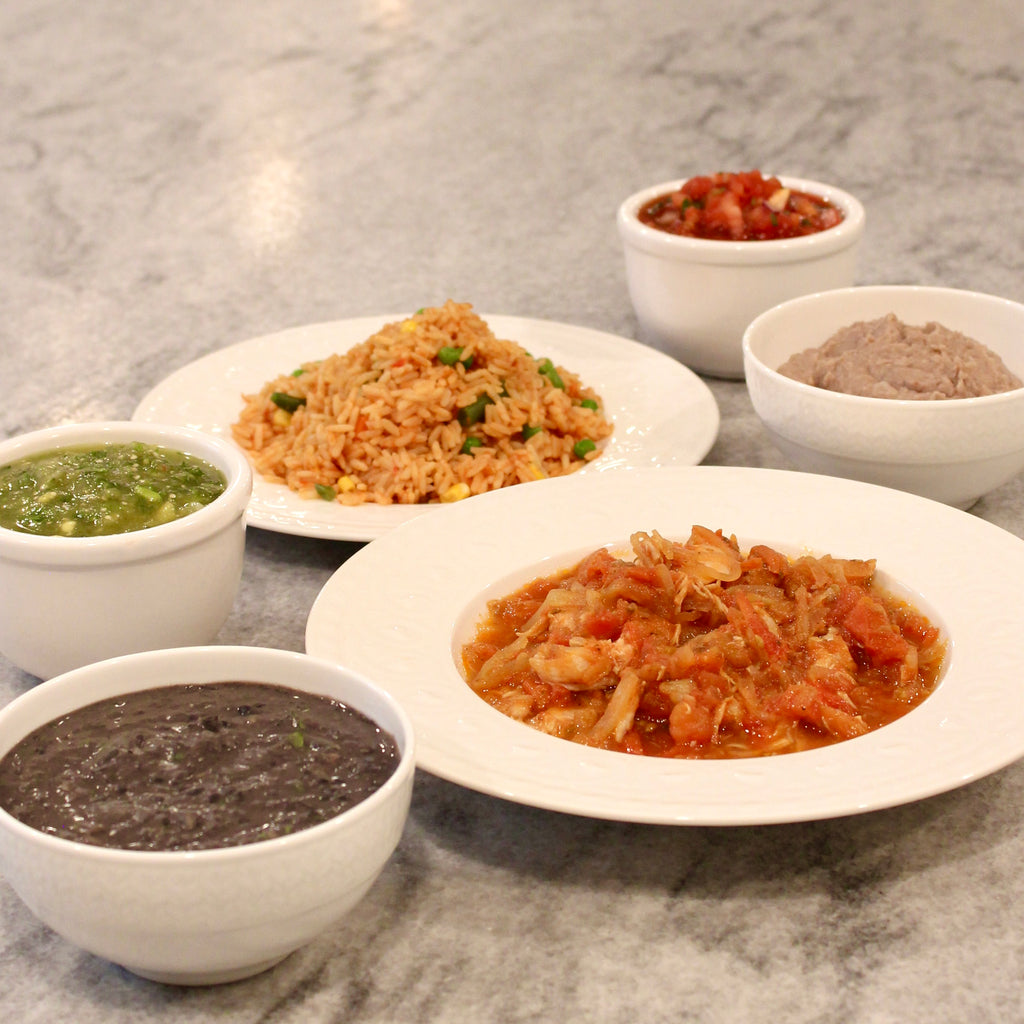 Pictured with Chicken Tinga, Mexican Rice with Vegetables, Refried Black Beans, Refried Pinto Beans & Salsa Roja.